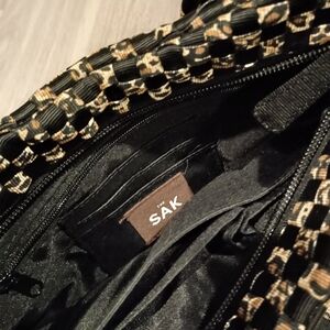 The SAK Woven Animal Leopard Print and Black Woven Purse Viscose Shoulder Bag